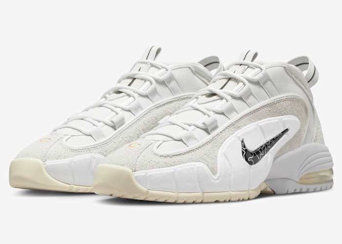 Grey and white Nike Penny shoes.